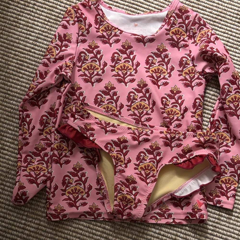 Pink chicken 2 piece bathing suit. Size 4.